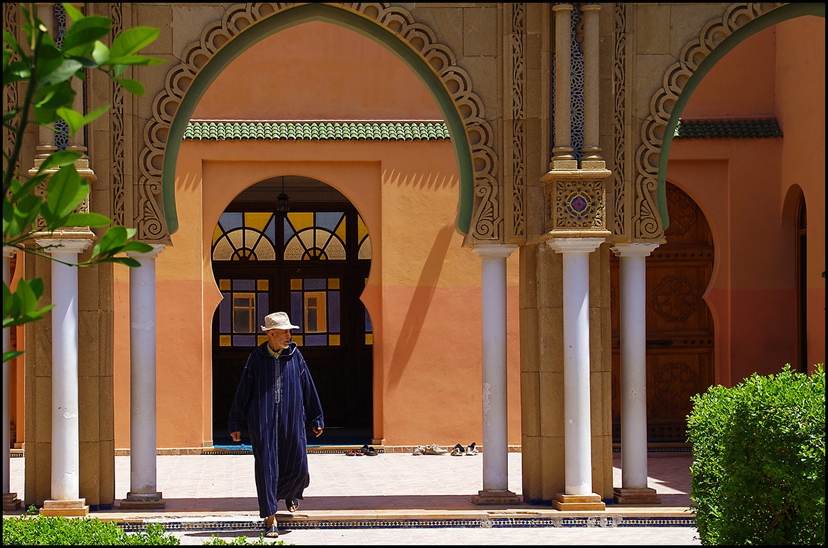 Marrakesh, Morocco. A man exiting a mosk near the villa where we spent two nights.