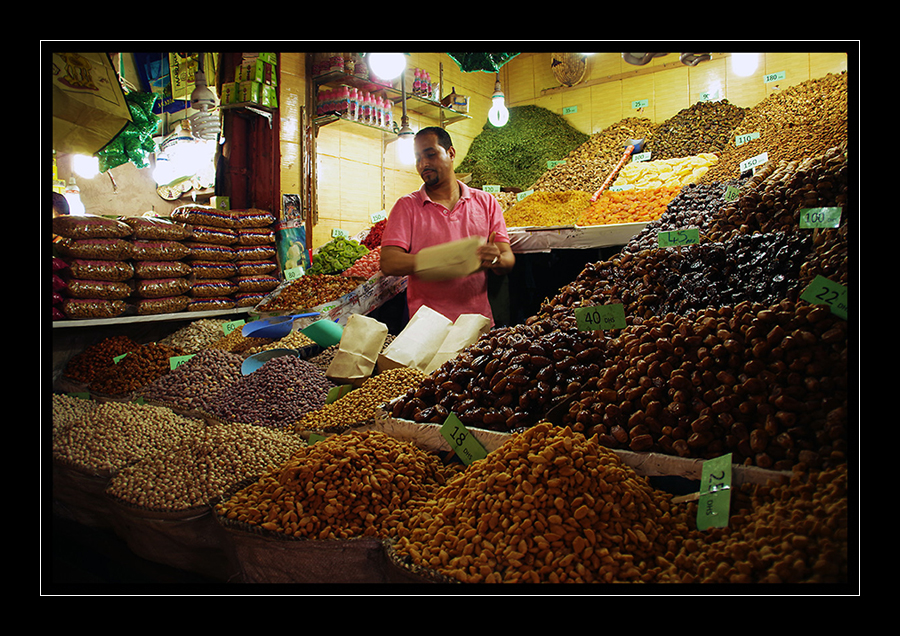 A fruit and nut vendor in the Marakesh Medina