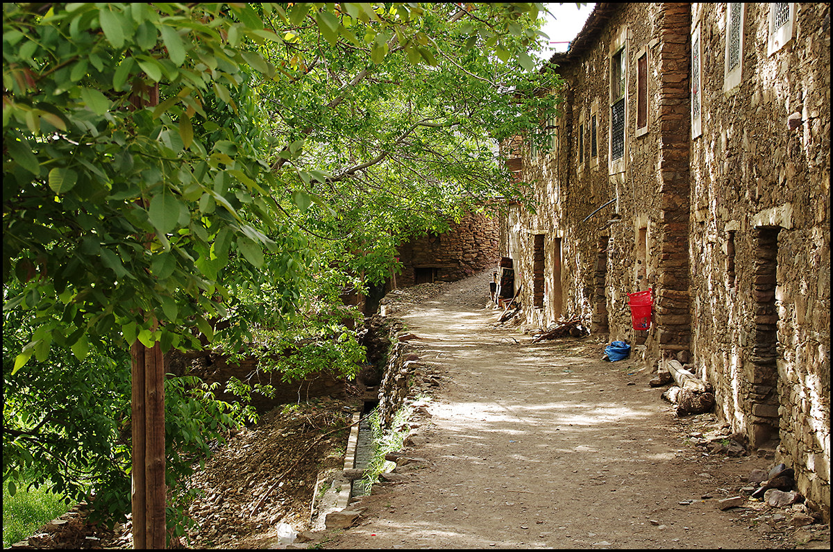 Foot path in the village of Imouzer Tichka in the Atlas Mountains of Morocco